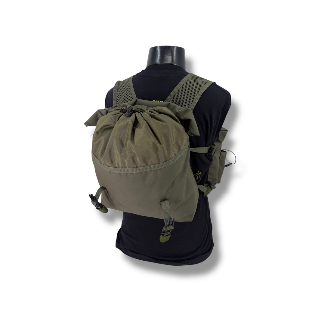 Green backpack on a mannequin with a white background